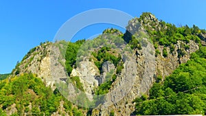 mountain road between rocks in the Romanian mountains Transfagarasan