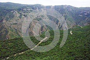 Mountain road serpentine through Syunik in Armenia route H45. Top view, landscape, view of the mountains