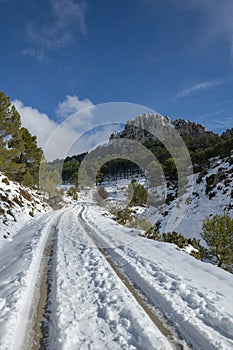 Mountain road to La Serrella (1.359 m) mountain in winter.