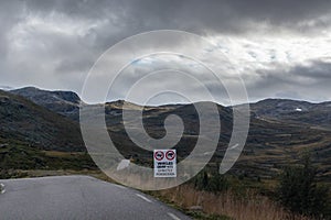 Mountain road warning drive autumn Norway landscape