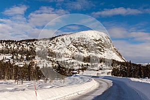 Mountain road in winter, at Loefjell mountain in Setesdal, Norway