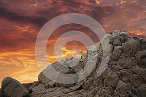 Mountain rock over sunset