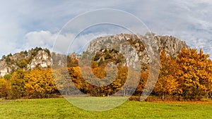 Mountain rocky landscape in autumn foggy morning