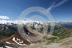 Mountain rocky ridge against blue sky in Caucasus