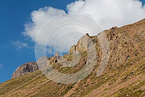 Mountain rocky wall of Tian Shan peaks in Tuyuk-Su