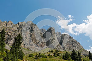 Mountain rocky wall of Tian Shan peaks in Tuyuk-Su