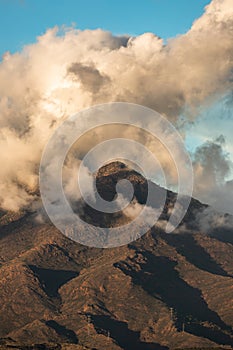 A mountain scene with cloud