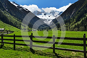 Mountain scenic with wood fence in Stilluptal Mayrhofen Austria Tirol