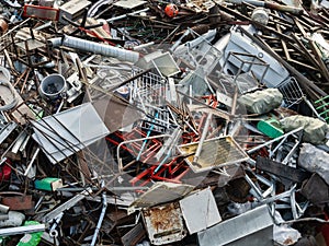 Mountain of scrap metal - predominantly ferrous metals photo