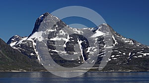 mountain in the sea with ice and snow, Nuuk, Greenland