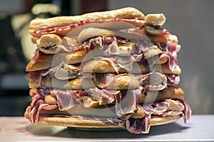 Mountain of Serrano ham sandwiches photo