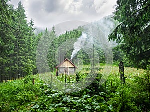 Mountain shelter in Carpathians during inclement weather photo