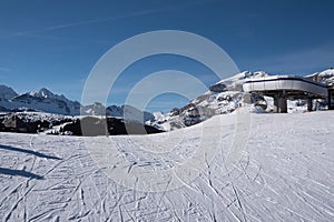 Mountain Ski Lift and Italian Dolomites Mountains, Snow covered Ski Slope, Italy