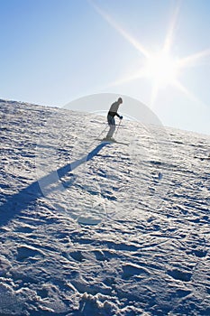 Mountain Skiing under blue sky