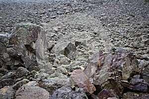 Mountain slope with a crumbling natural stone