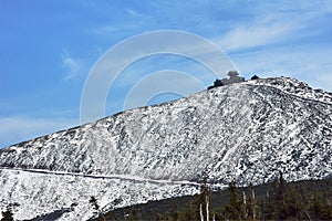 Mountain slope and shelter in winter in the Giant Mountains