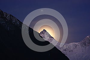 Mountain, star and moon halo