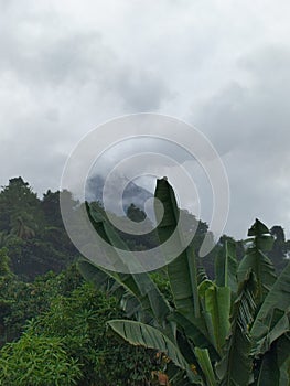 A mountain that is still active in the city of Siau photo