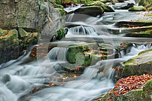 Mountain stream in autumn photo