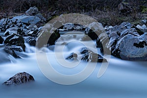 Mountain stream during blue hour with silky water