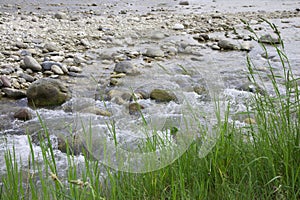 Mountain stream flowing from the glacier