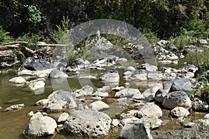 Mountain stream view with stones photo