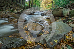 Mountain stream with waterfall