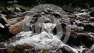 Mountain stream and waterfall