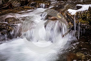 Mountain stream with waterfalls