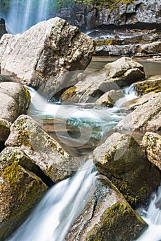 Mountain streams flowing water in the woods and atomized water