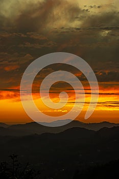 mountain sunset having clouds sky