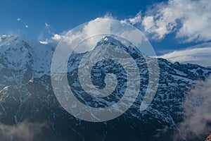 Mountain surrounded by clouds at Mardi Himal Trek in Himalaya mountains