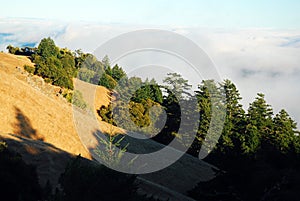 A mountain top over the clouds