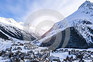 Mountain top view in winter. Ski routes in the mountains. Snowy winter mountain background.