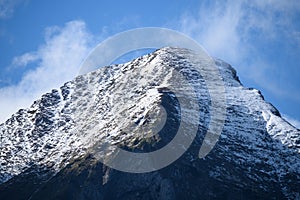 Mountain tops in autumn covered in mist or clouds