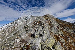 Mountain tops in autumn covered in mist or clouds