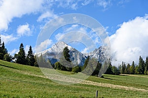 Mountain tops in autumn covered in mist or clouds