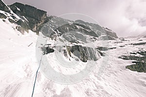 Mountain tops in winter covered in snow - vintage film look