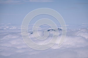 Mountain tops in winter covered in snow - vintage retro look