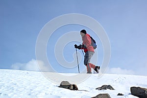 Mountain tourist on snow slope