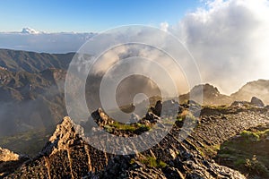 Mountain trail Pico do Arieiro, Madeira Island, Portugal Scenic view of steep and beautiful mountains during sunrise.