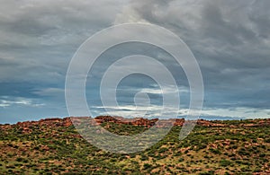 Mountain treeless landscape in the morning with cloudy sky photo