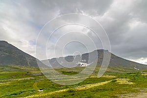 Mountain tundra with mosses and rocks covered with lichens, Hibiny mountains above the Arctic circle, Kola peninsula, Murmansk