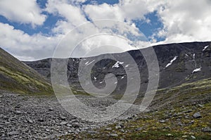 Mountain tundra with mosses and rocks covered with lichens, Hibiny mountains above the Arctic circle, Kola peninsula, Russia