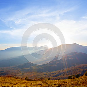 mountain valley in blue mist