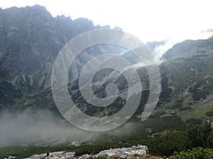 Mountain valley on a high tatra mountains-mountain valley in dense mist and clouds