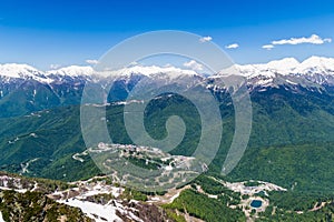 Mountain valley with snow-capped mountain peaks. height 2320 above sea level Esto-Sadok Russia Sochi