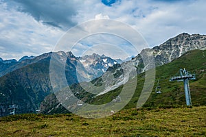 Mountain valley with snow peaks and clouds in Tetnuldi