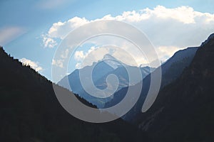 A Mountain Vally with a Cloudy Background