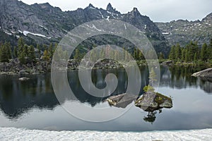 Mountain is very clean and clear lake. Magnificent summer landscape in the mountains.